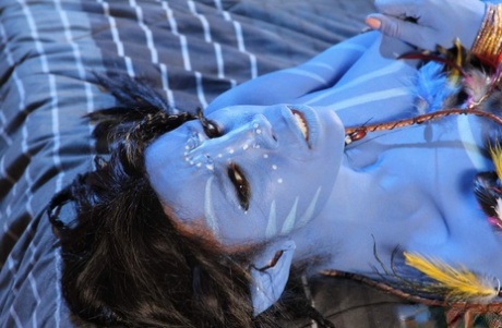Cosplay beauty Misty Stone takes cock in nothing but blue body paint