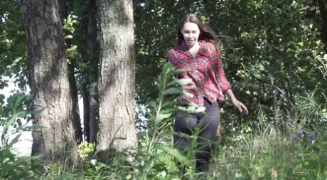 White girl Sasha squats for an urgent piss while in the great outdoors