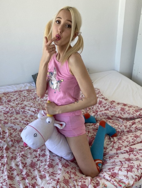 Blonde amateur Sugar Lya wears her hair in pigtails during a POV blowjob