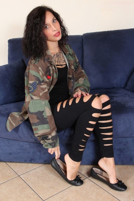 Pretty brunette Dolly C releases her even prettier feet from flat shoes