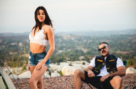 Kylie Rocket dons her man's colors after going nude while camping