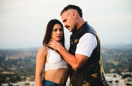 Kylie Rocket dons her man's colors after going nude while camping
