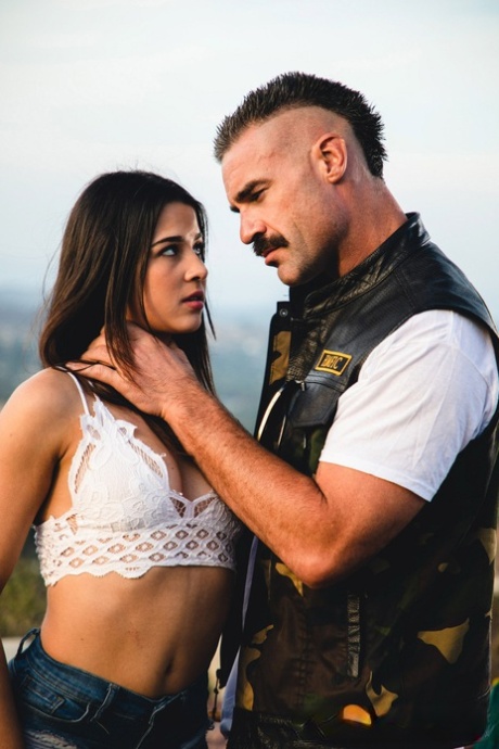 Kylie Rocket dons her man's colors after going nude while camping