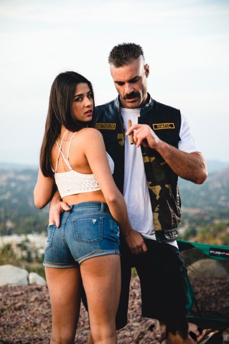 Kylie Rocket dons her man's colors after going nude while camping