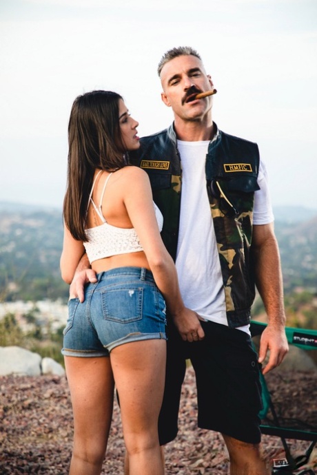 Kylie Rocket dons her man's colors after going nude while camping