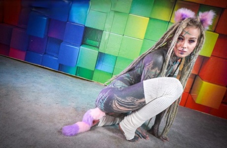 Heavily tattooed chick Anuskatzz toys her asshole while sporting dreadlocks