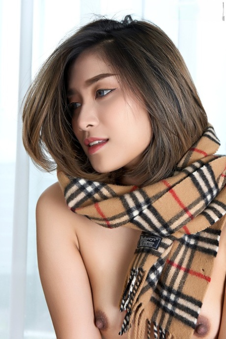 Asian beauty Apple gets bare naked with a winter scarf around her neck