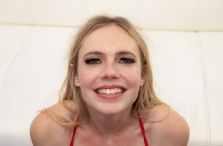 Natural blonde Rebel Rhyder gets on her knees for three big cocks