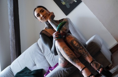 Heavily tattooed girls Nux Vomica & Anuskatzz partake in lesbian sex