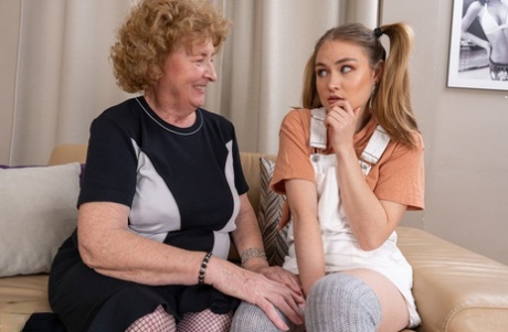 Young looking girl has lesbian sex with a really old woman on a sofa