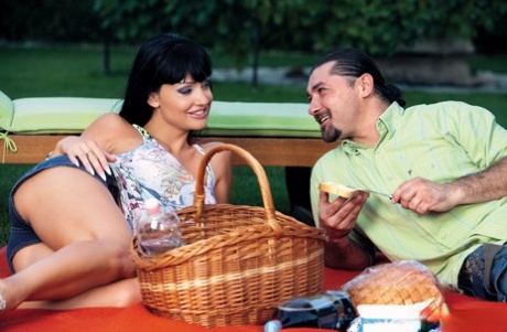 Dark-haired female Aletta Ocean uncovers her fate tits before sex in a yard