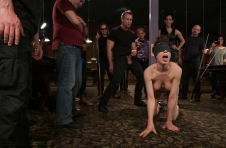 Naked brunette is restrained and penetrated inside a billiard club