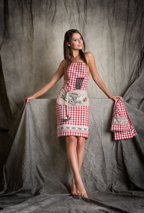 Skinny teen with a tight ass Lorena G spreads her legs after removing an apron