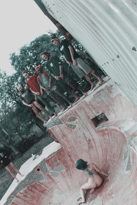 Alternative individuals have sex at a skate park while being pissed on