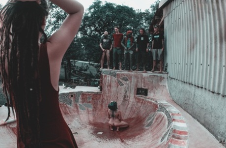 Alternative individuals have sex at a skate park while being pissed on