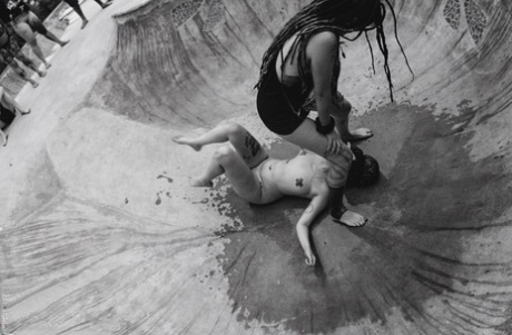 Alternative individuals have sex at a skate park while being pissed on