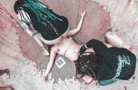 Alternative individuals have sex at a skate park while being pissed on