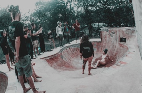 Alternative individuals have sex at a skate park while being pissed on
