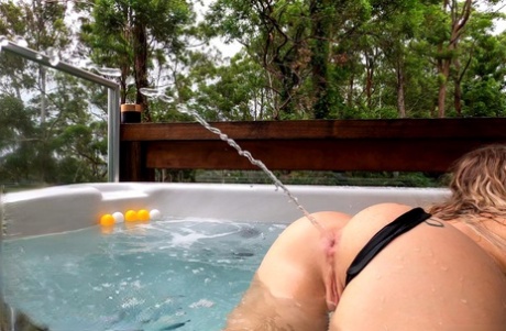 Scarlet Chase squirts while sporting a butt plug prior to giving a POV blowjob