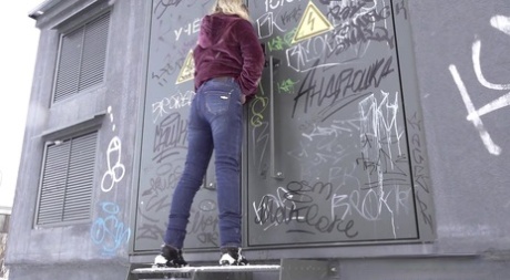 Caucasian girl Jessy shows her bare ass while peeing on snow-covered ground