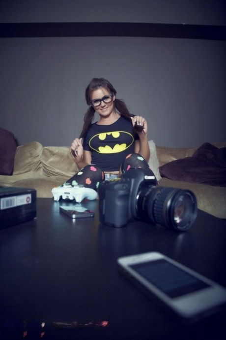 British girl Kat Dee gets naked in over the knee socks and glasses
