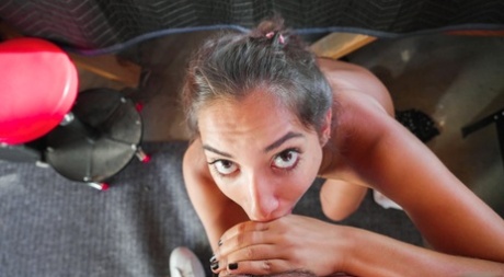 Brunette cougar Kitty Rivera gives her stepson oral sex on her knees