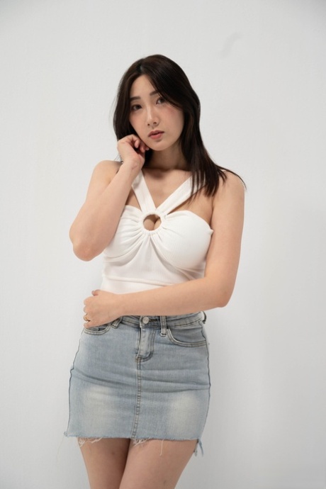 Chinese chick Li Er shows her big tits during sexual intercourse