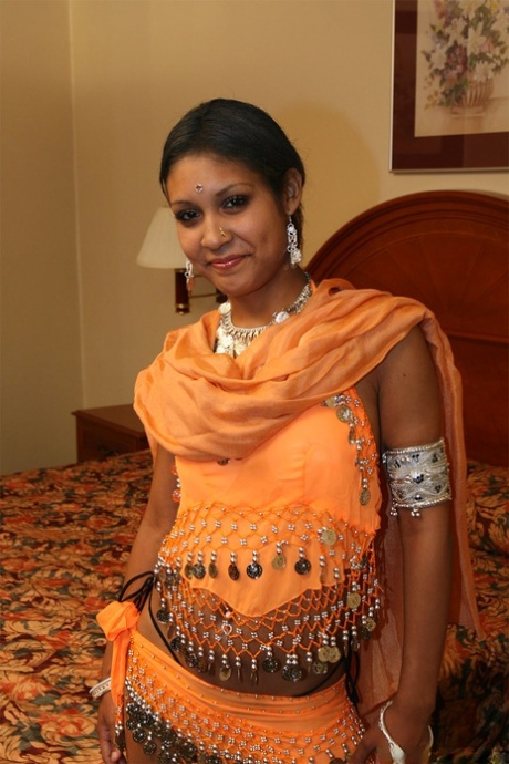 Indian female Dipti flashing her ass and nipples in her bedroom
