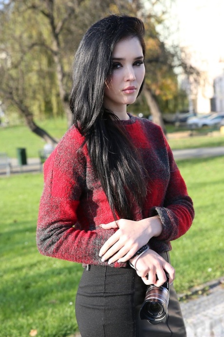 Brunette glamour model Malena in boots posing non nude outdoors