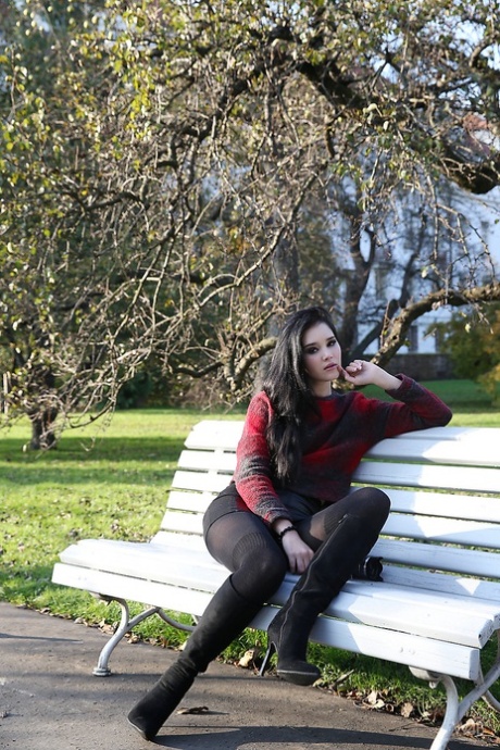 Brunette glamour model Malena in boots posing non nude outdoors