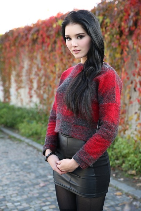 Brunette glamour model Malena in boots posing non nude outdoors