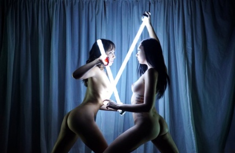 Naked lesbians Jenna Sativa & Marley Brinx wield lightsabers before having sex