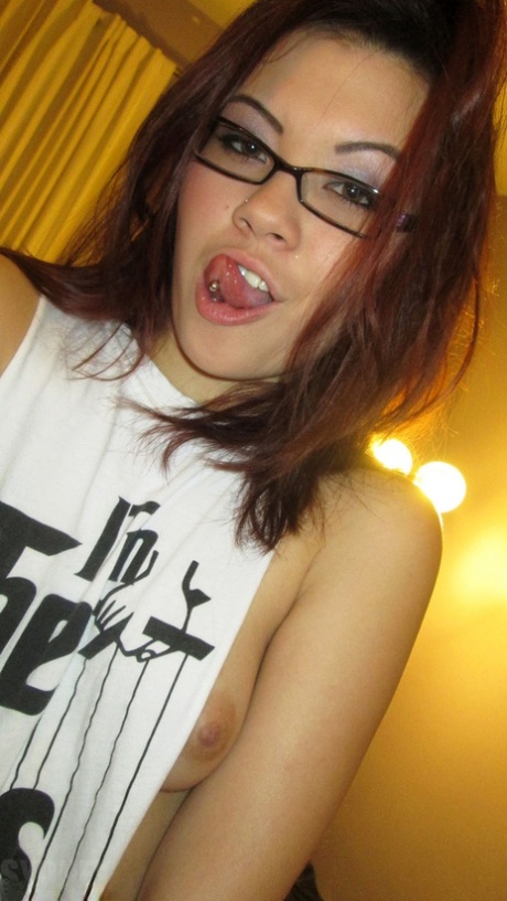 Pierced amateur Sydney Mai in glasses & socks showing cameltoe & nice tits