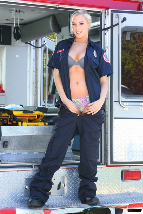 Horny babe in a nurse uniform gets undressed to reveal her amazing hot body