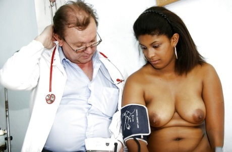 Fat bitch Manuela has her big tits and her pussy teased by her doctor