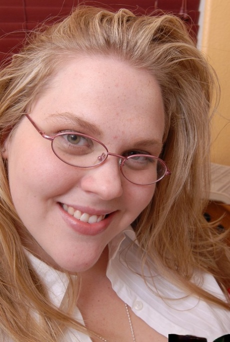 Fat blonde chick in glasses Christina lets her huge fat juggs loose