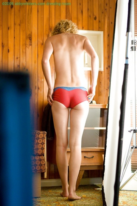 A perverted peeking Tom watches young amateur Sue getting dressed