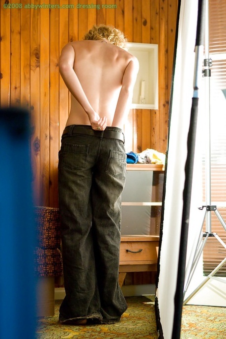 A perverted peeking Tom watches young amateur Sue getting dressed