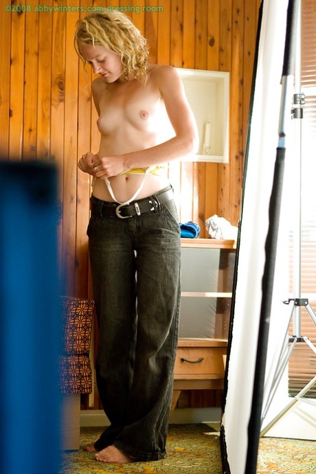 A perverted peeking Tom watches young amateur Sue getting dressed