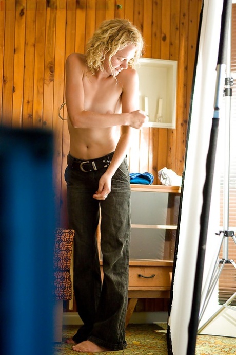 A perverted peeking Tom watches young amateur Sue getting dressed