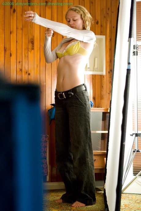 A perverted peeking Tom watches young amateur Sue getting dressed