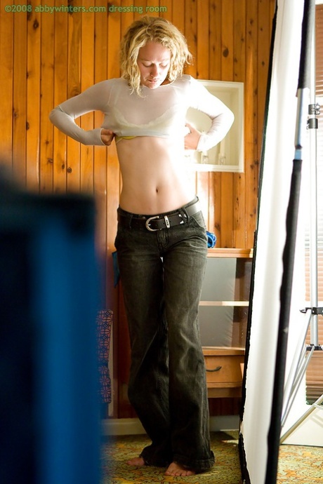 A perverted peeking Tom watches young amateur Sue getting dressed
