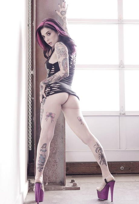 Amateur MILF Joanna Angel showing off her heavily tattooed body in the nude