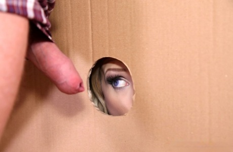 Blonde bride Angel Wicky sucks off an uncut dick at a gloryhole