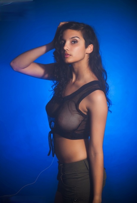 Indian female models non nude in a see thru top and shorts