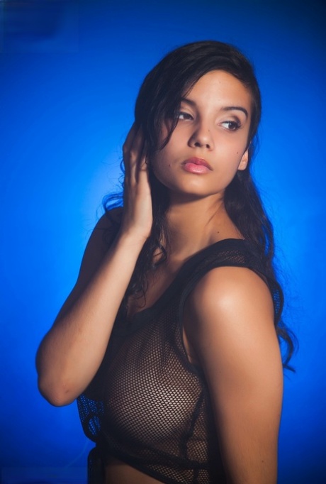 Indian female models non nude in a see thru top and shorts