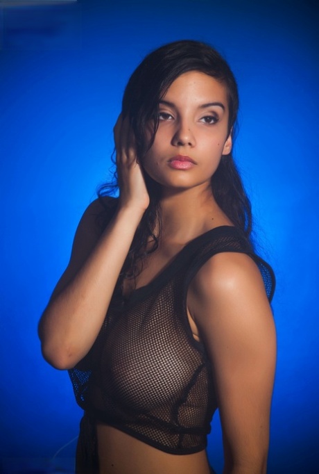 Indian female models non nude in a see thru top and shorts