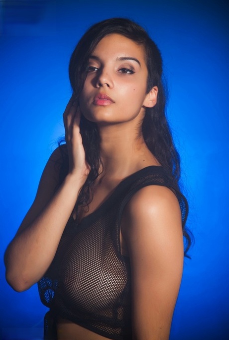 Indian female models non nude in a see thru top and shorts