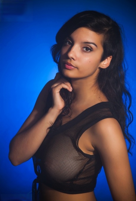Indian female models non nude in a see thru top and shorts