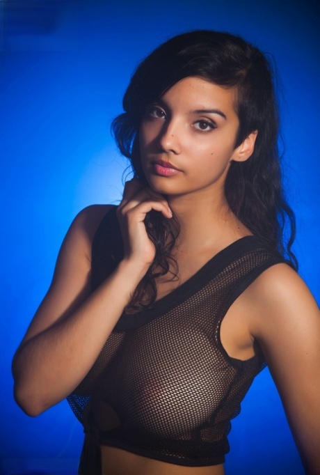 Indian female models non nude in a see thru top and shorts